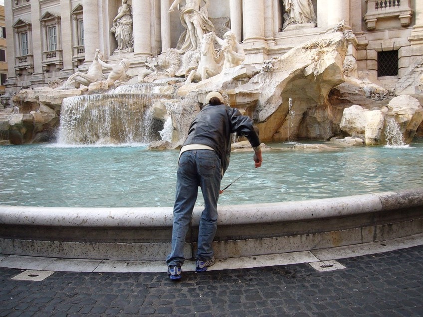 Stealing Coins From the Fountain of Trevi