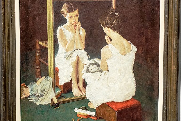 “Girl at Mirror” by Norman Rockwell – A Glimpse of Innocence
