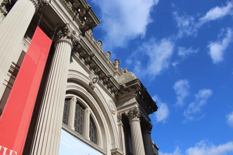 The columned Fifth Avenue facade and entrance steps of the Metropolitan Museum of Art in New York.