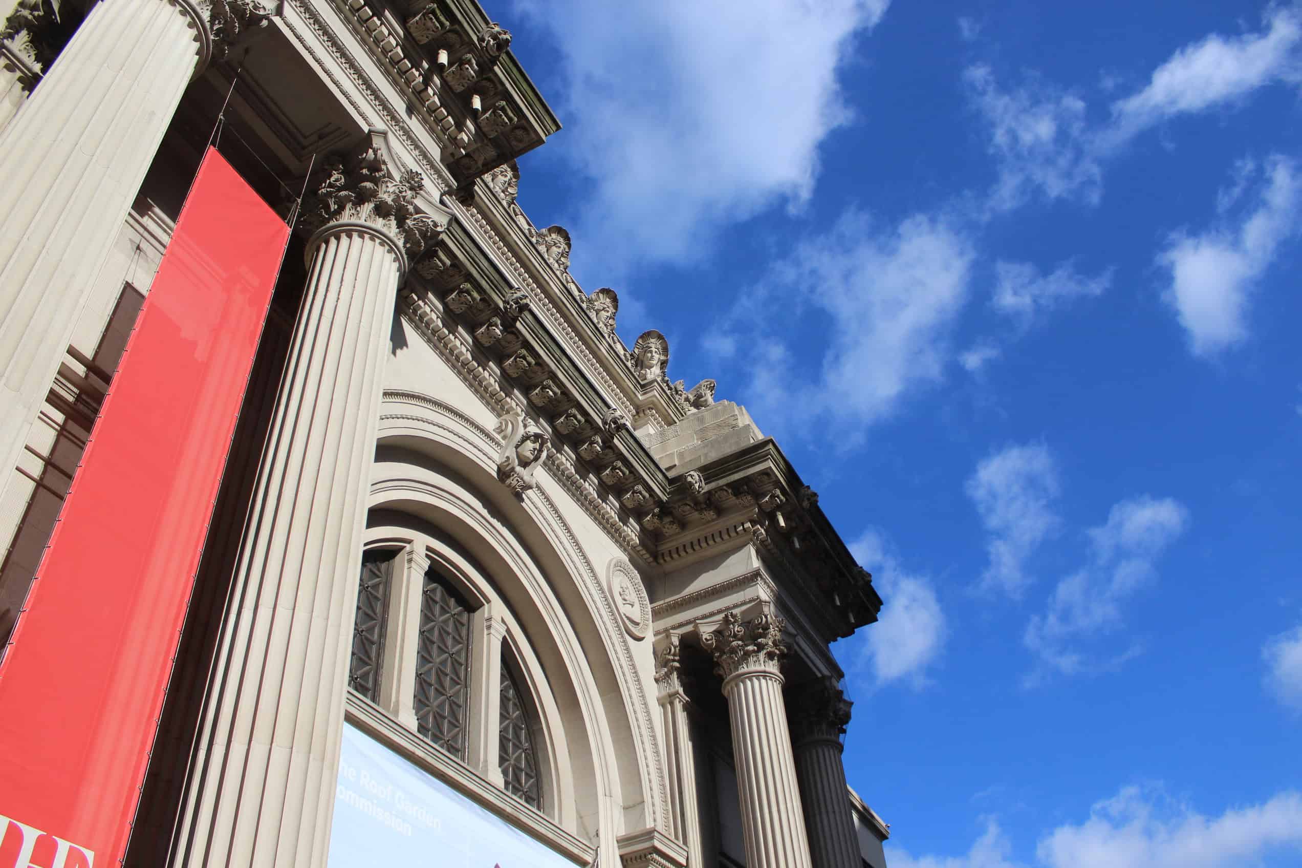 The columned Fifth Avenue facade and entrance steps of the Metropolitan Museum of Art in New York.