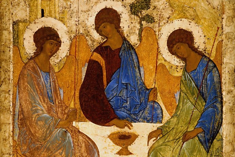 Andrei Rublev’s Trinity shows three haloed angels seated around a table with a chalice.