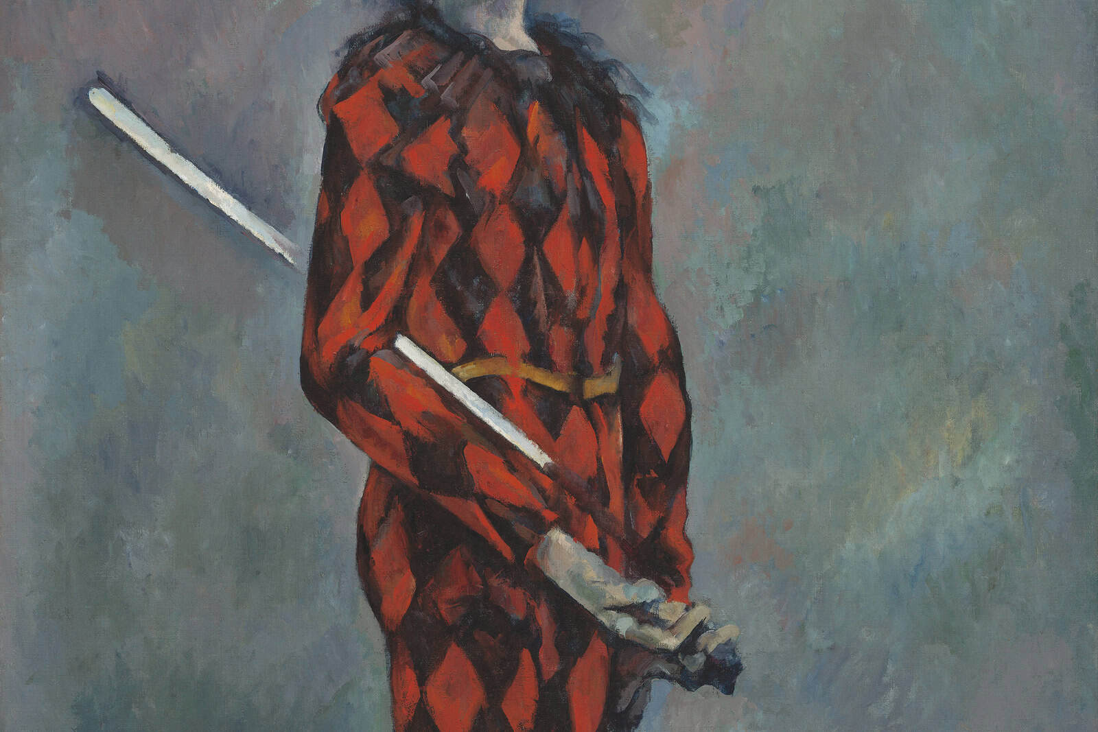 A standing Harlequin wears a red-and-black diamond-patterned costume in Paul Cézanne’s related National Gallery of Art painting.