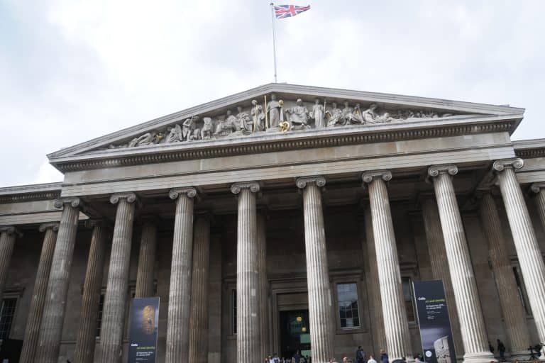 The columned neoclassical facade and main entrance of the British Museum in London.