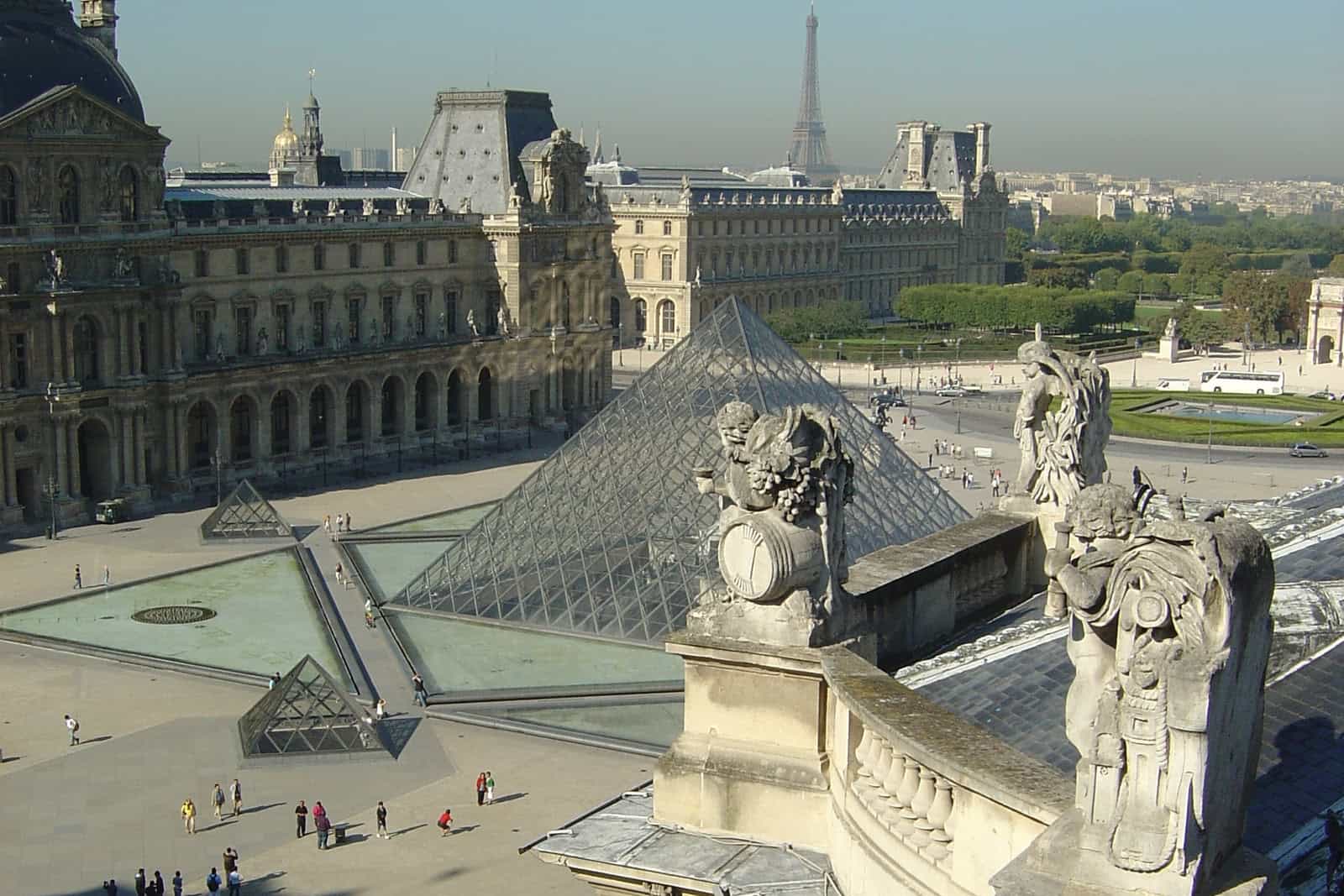 Elevated view of the Louvre courtyard and pyramid in Paris