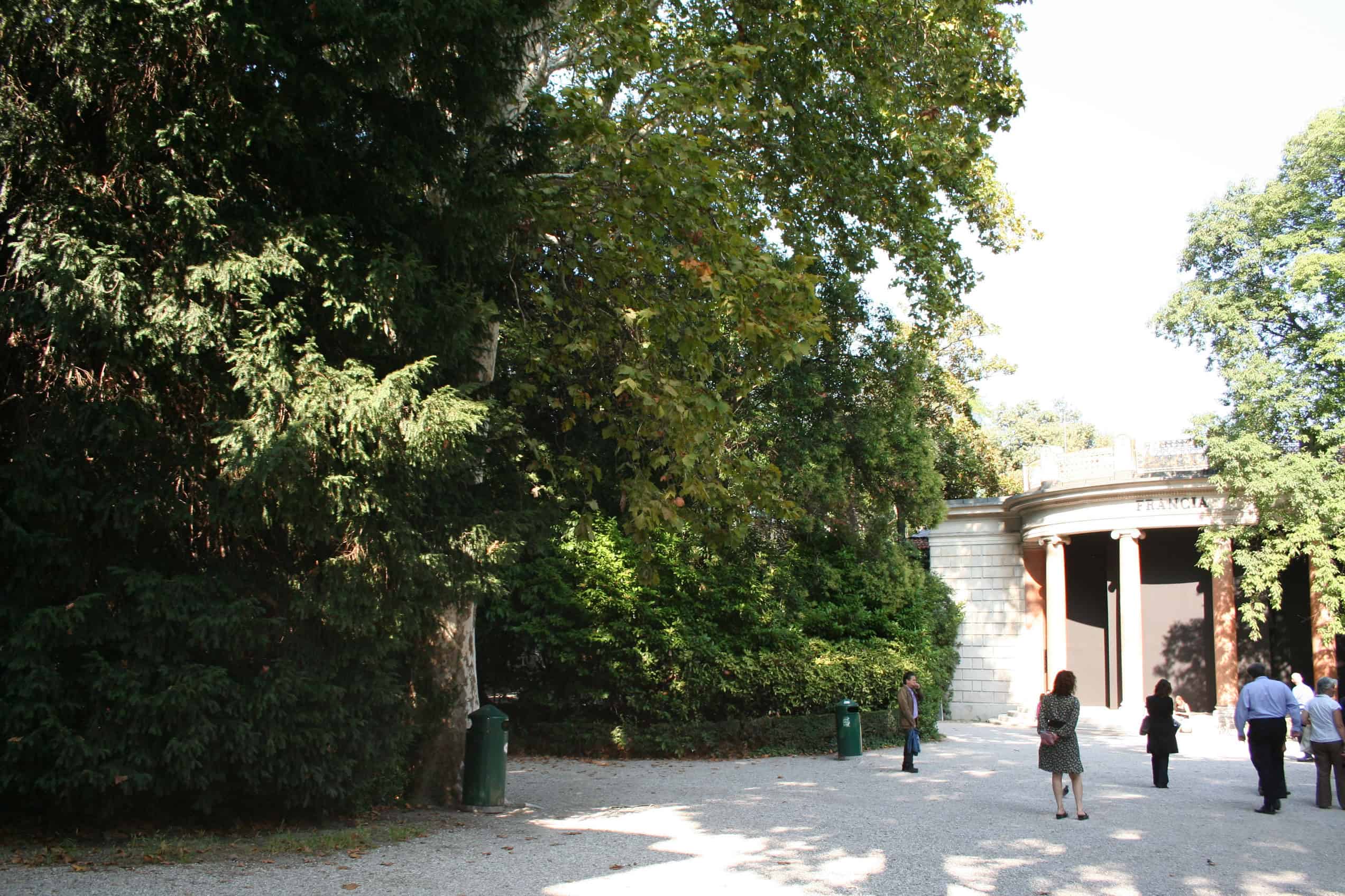 The columned French Pavilion stands among trees in Venice's Giardini in 2009.