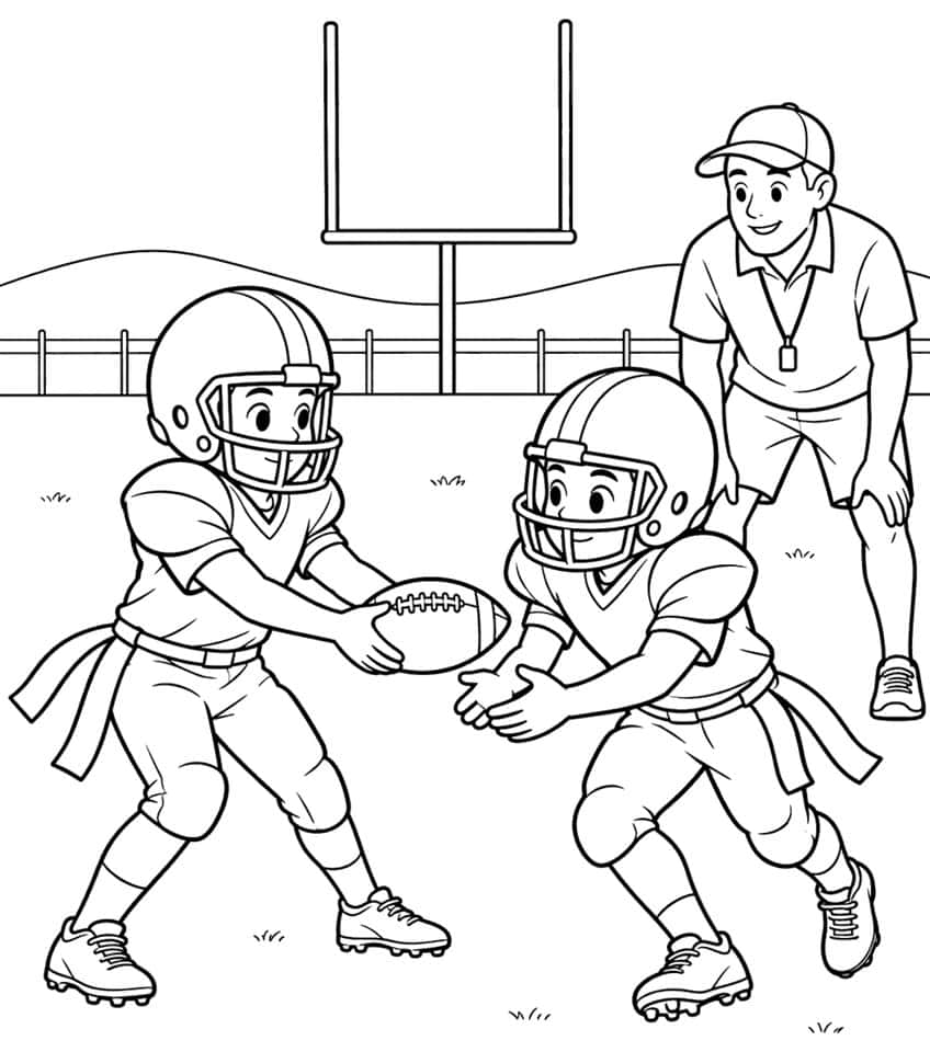 Two young football players in helmets making a handoff while a coach with a whistle watches near a goalpost