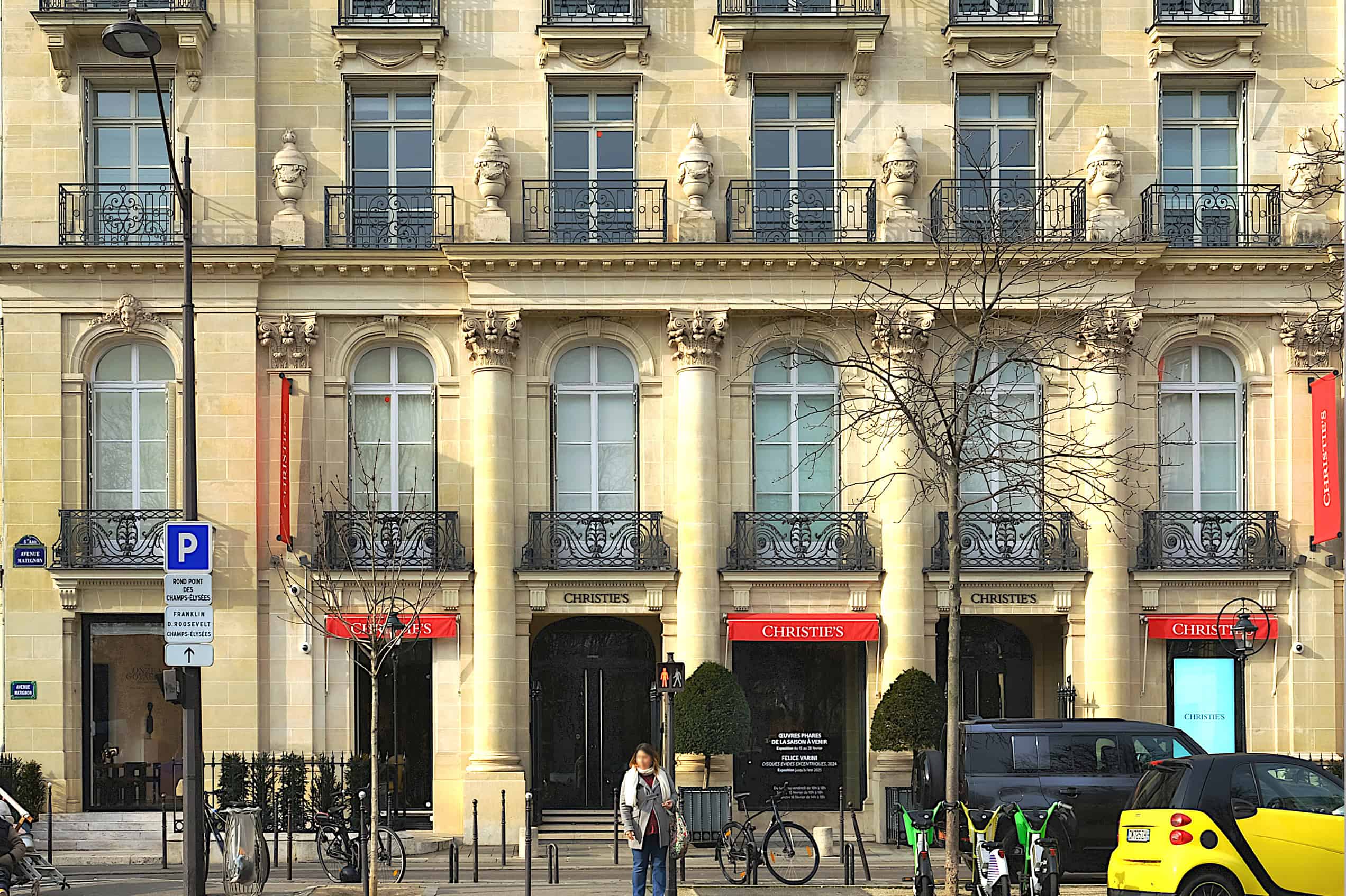 The stone façade and entrance of Christie’s France on Avenue Matignon in Paris.