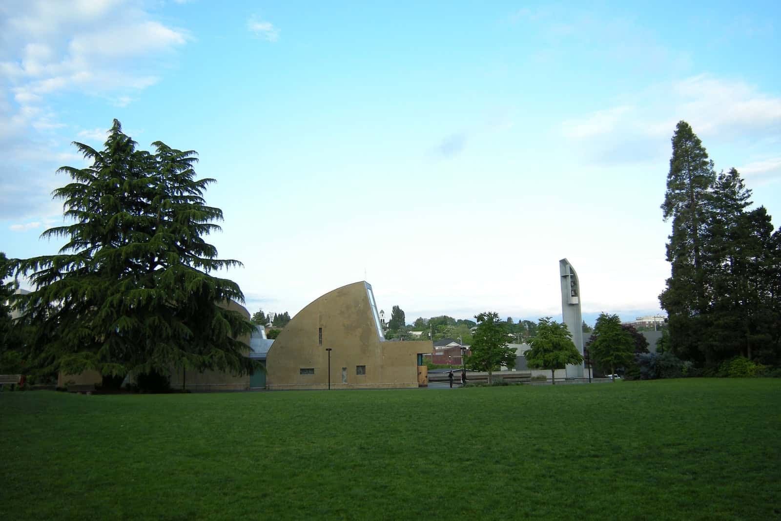 The geometric Chapel of St. Ignatius stands beside a lawn on Seattle University’s campus.