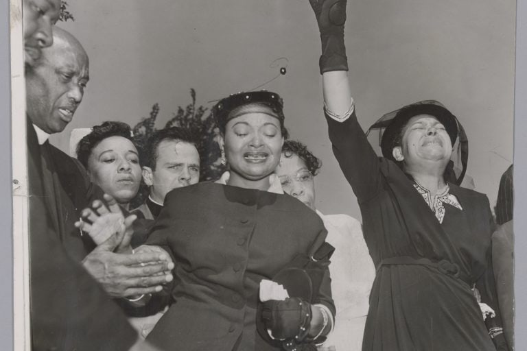 Mourners stand together at Burr Oak Cemetery during Emmett Till’s funeral on September 6, 1955.