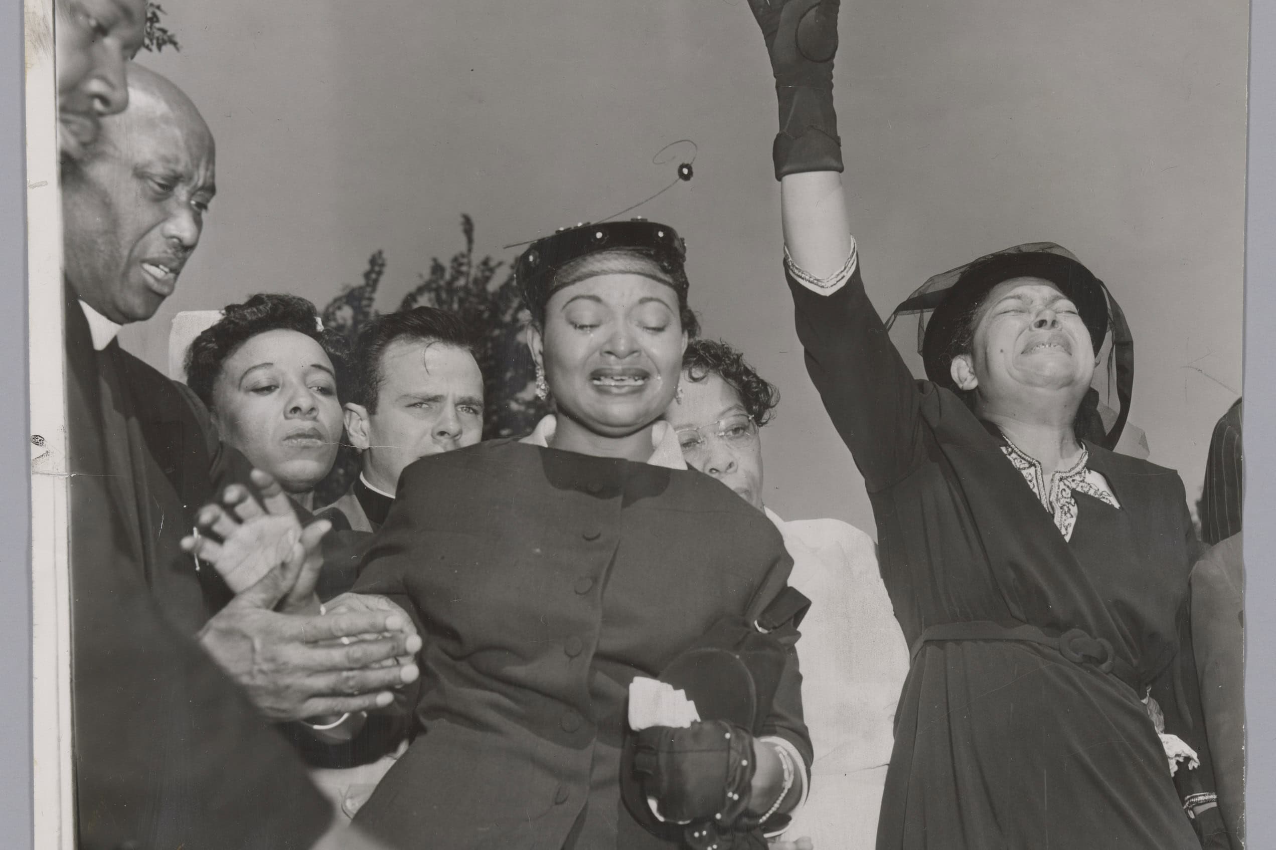 Mourners stand together at Burr Oak Cemetery during Emmett Till’s funeral on September 6, 1955.