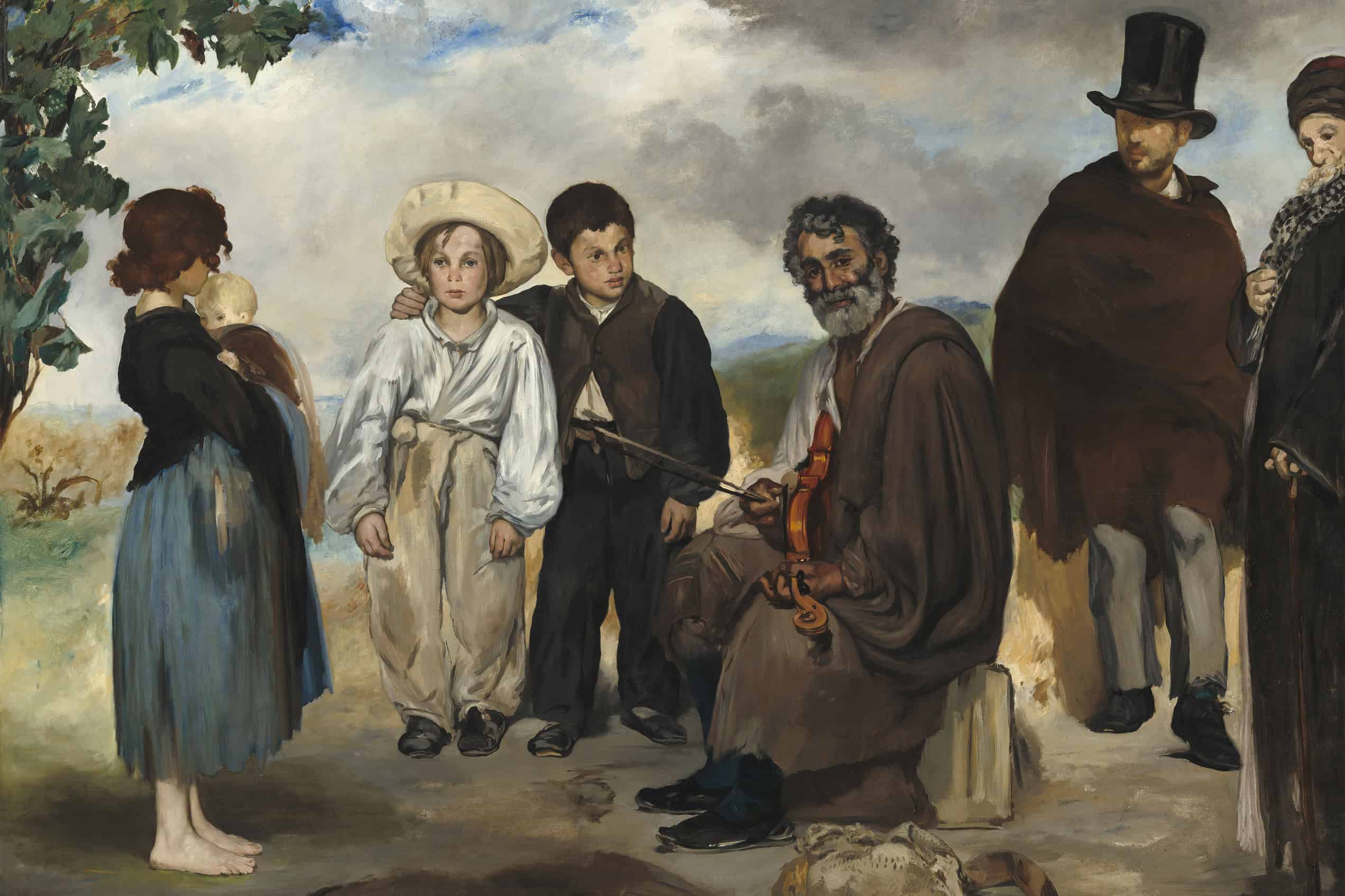A group of six people in worn clothing gathers around an elderly violinist in a sparse landscape.