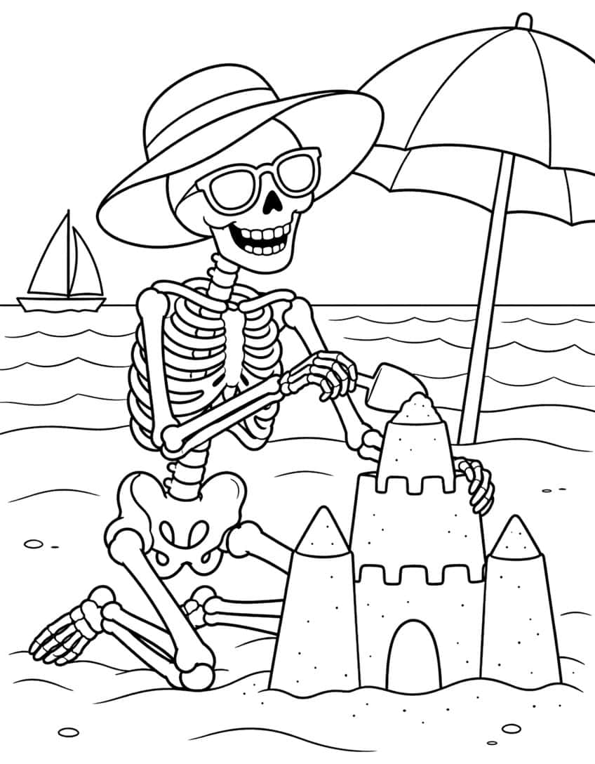 Skeleton in sun hat and sunglasses building a sandcastle beside a beach umbrella and sailboat