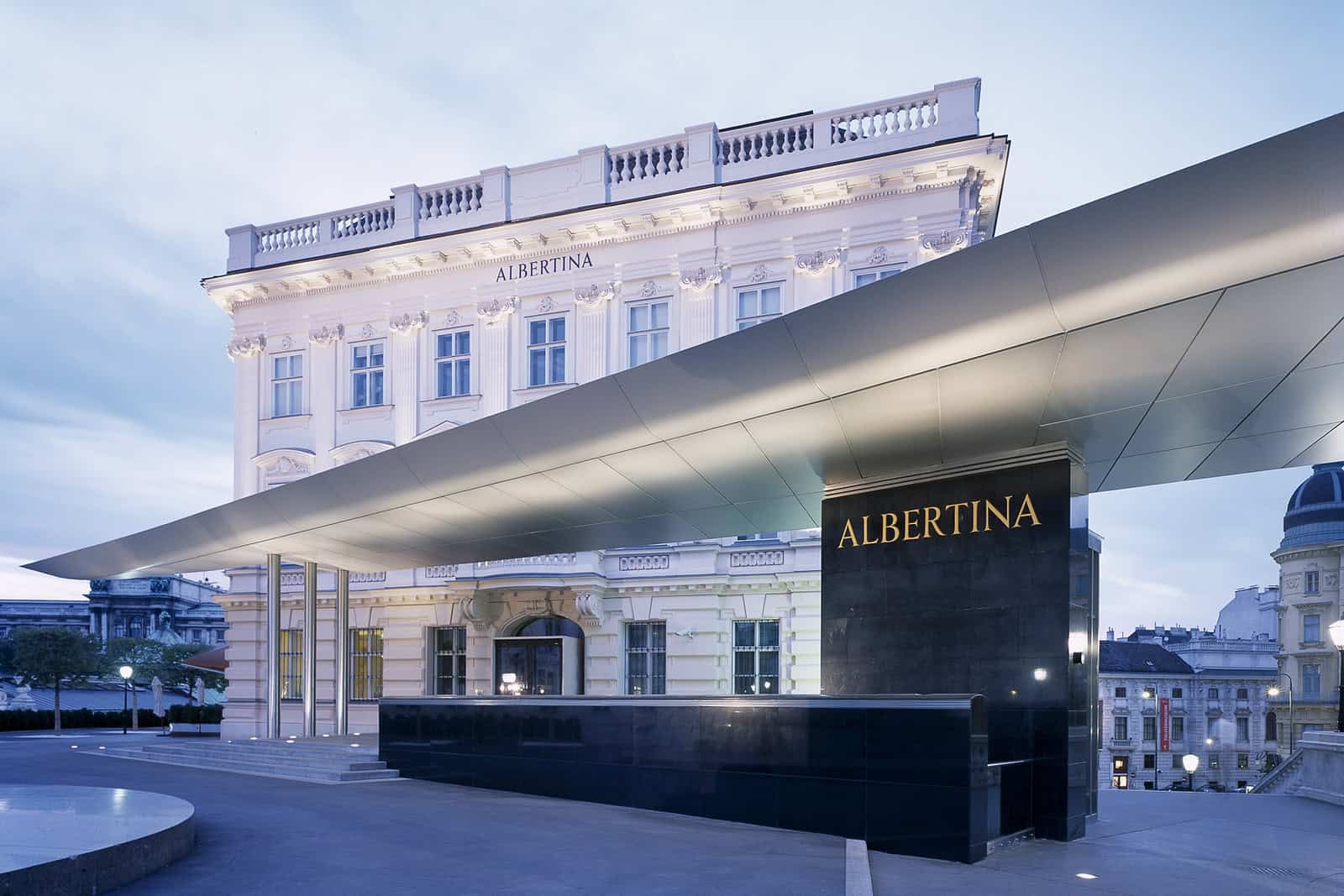 The pale stone Albertina Museum in Vienna rises above a broad stepped terrace.