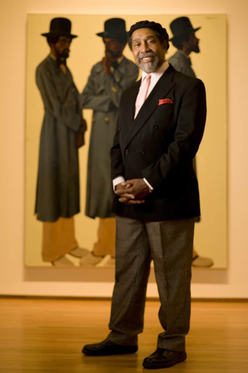 Barkley L. Hendricks poses beside his 1975 portrait Bahsir (Robert Gowens) at the Nasher Museum in 2013.