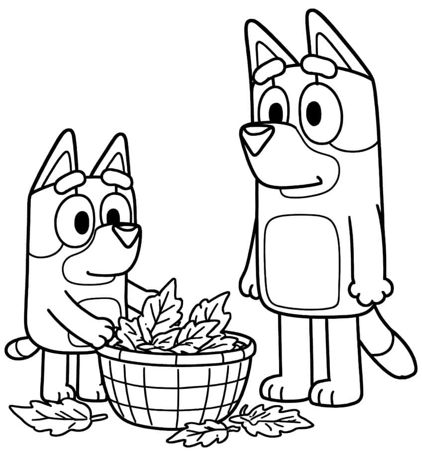 Small pup and tall pup beside a woven basket full of leaves, with three fallen leaves on the ground