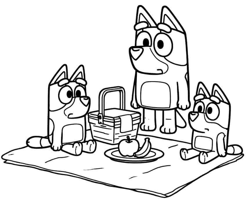 Three cartoon pups on a picnic blanket with a basket and a plate of apple and banana