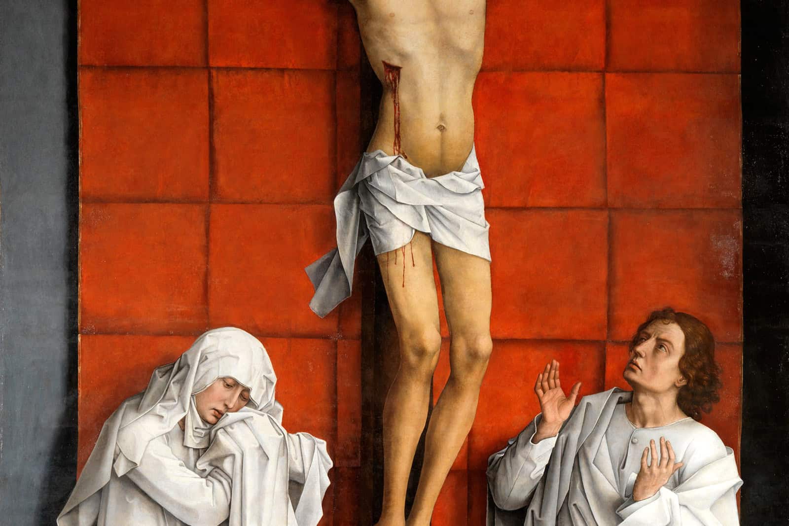Christ on the cross stands between the Virgin and Saint John, whose white robes contrast with the red canopy in Rogier van der Weyden’s Calvary.