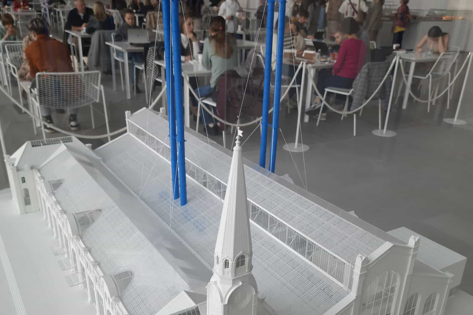 Tall interior space inside the renovated GES-2 cultural center in Moscow.