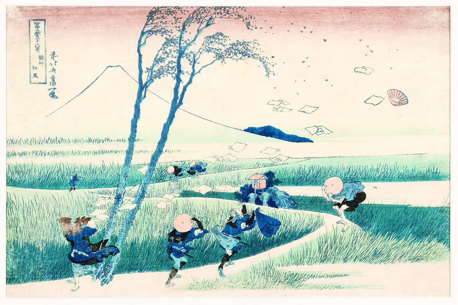 Travelers struggle against a gust that sends papers through the air while Mount Fuji remains still in the distance.