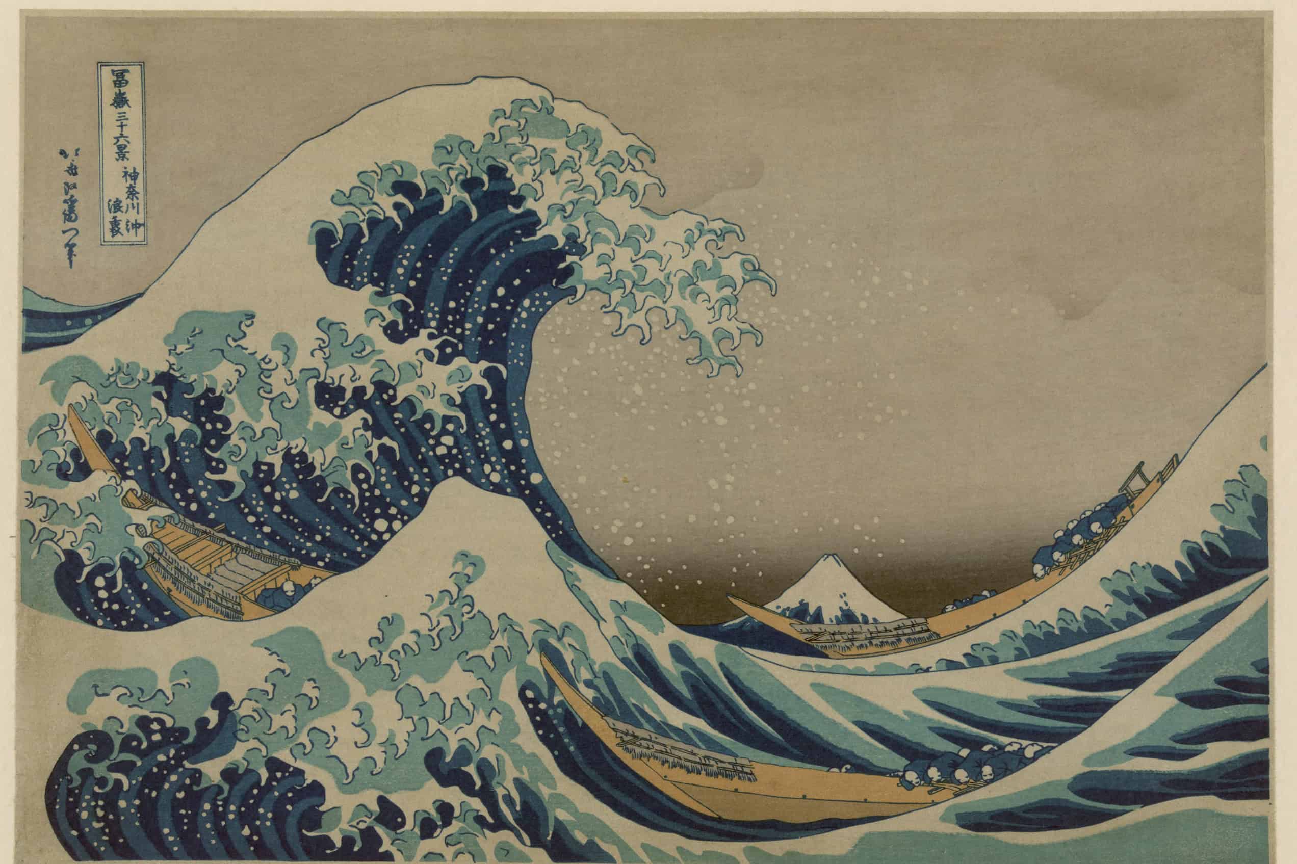Hokusai’s Great Wave curls above three boats while snowcapped Mount Fuji appears on the distant horizon.
