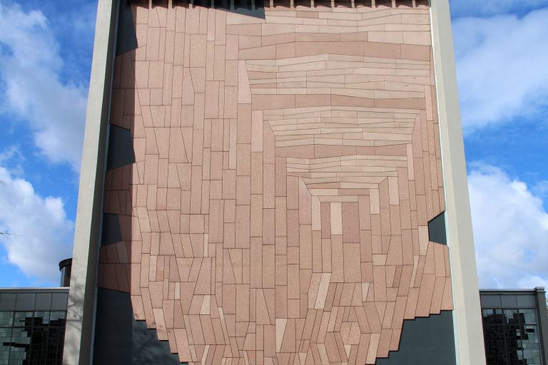The modernist facade and entrance of Kulturkirche Liebfrauen in central Duisburg.