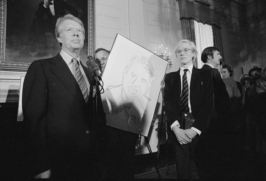 President Jimmy Carter with Andy Warhol at a White House reception for inaugural portfolio artists, June 14, 1977
