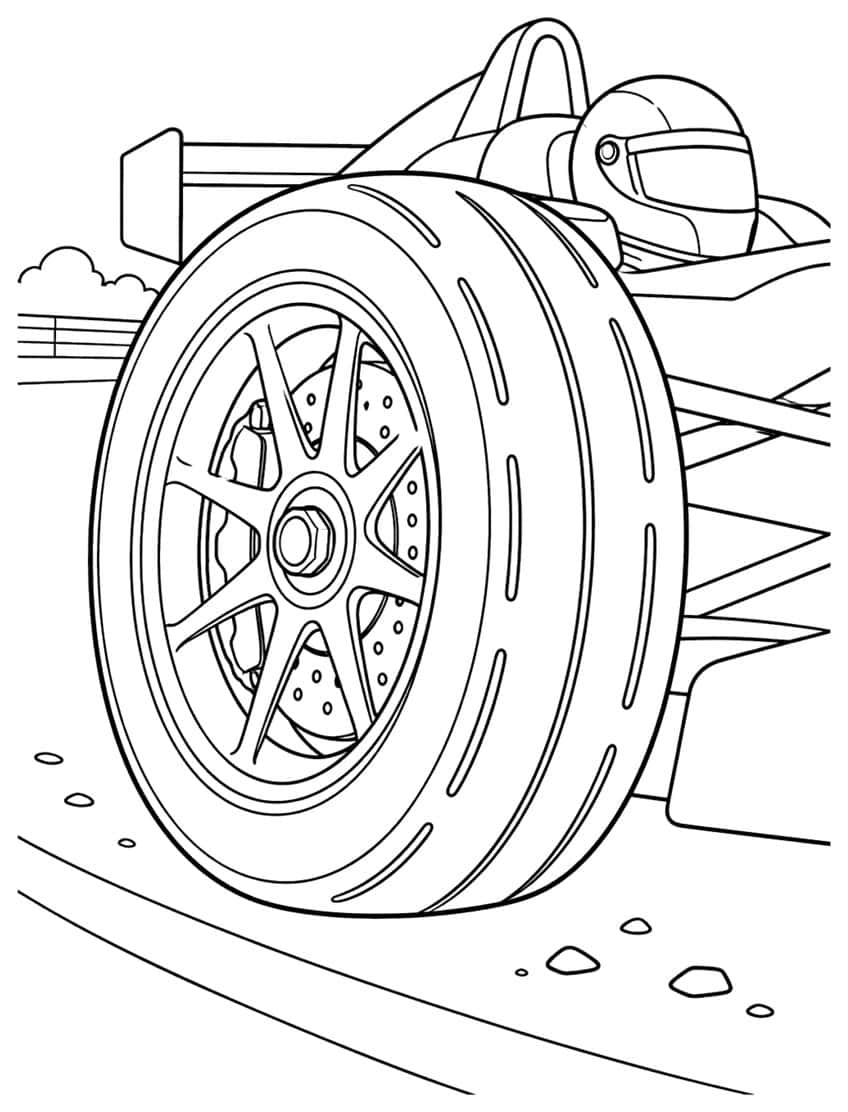 Close-up of a formula car front wheel with spoked rim, brake disc, driver helmet, rear wing and pebbles