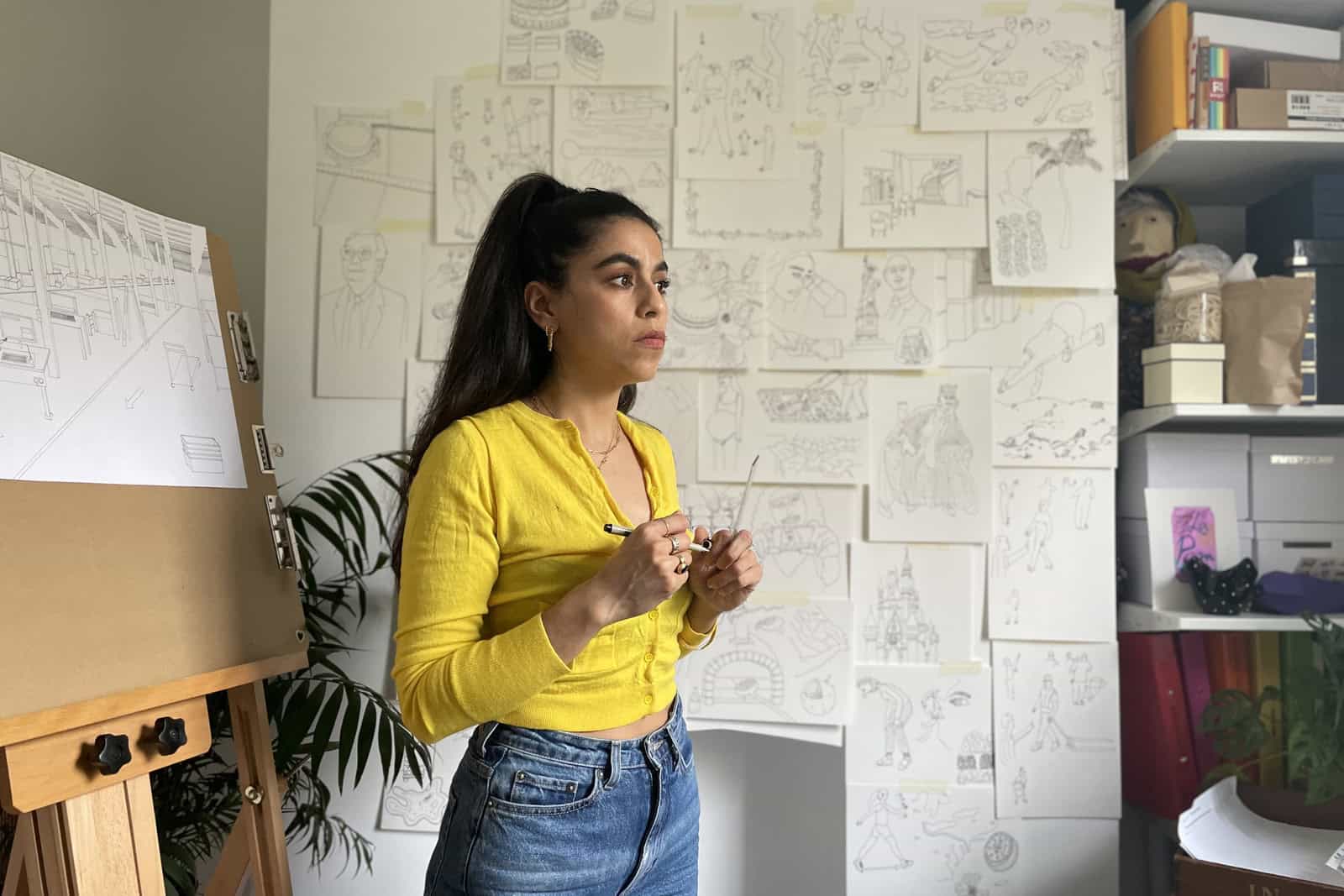 Mona Chalabi looks toward the camera in a close portrait.