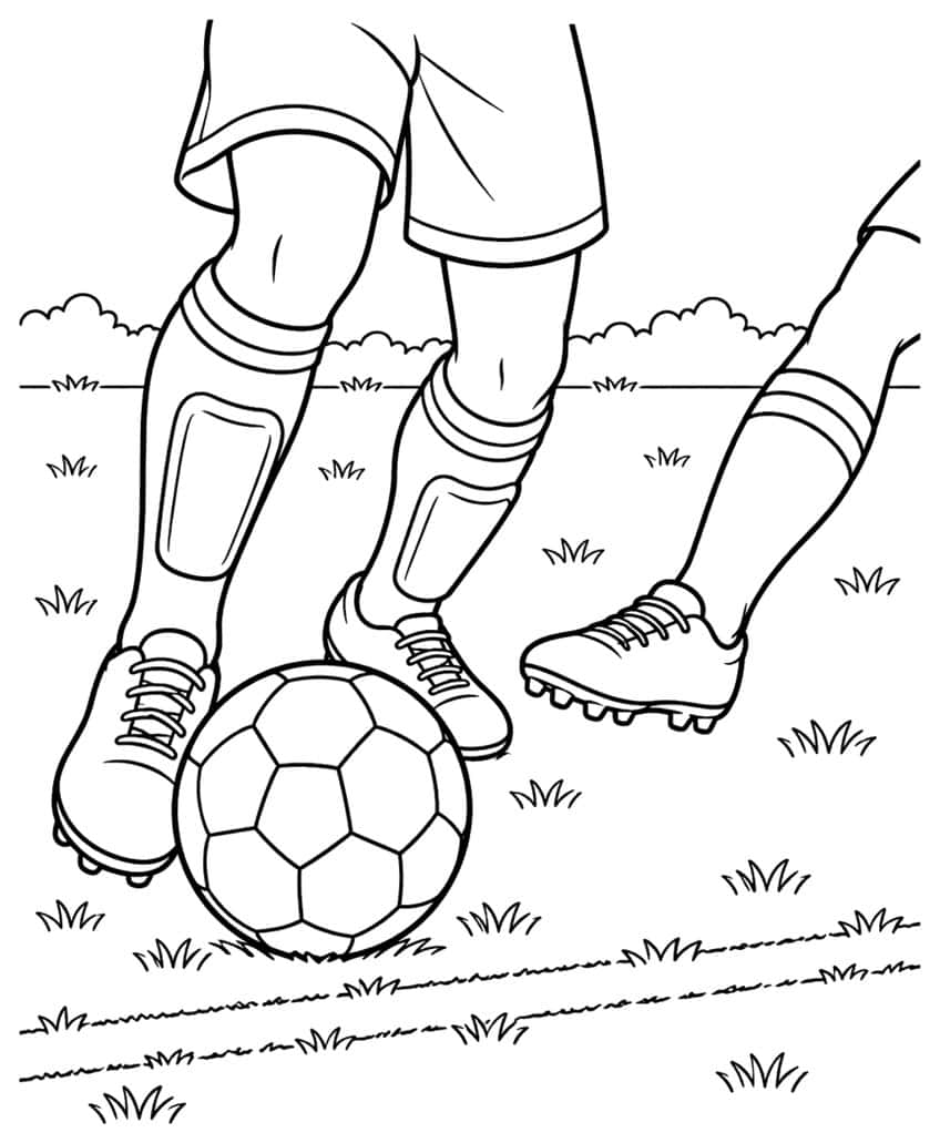 Close-up of two cleated feet dribbling a soccer ball, with an opponent's leg and grass tufts around