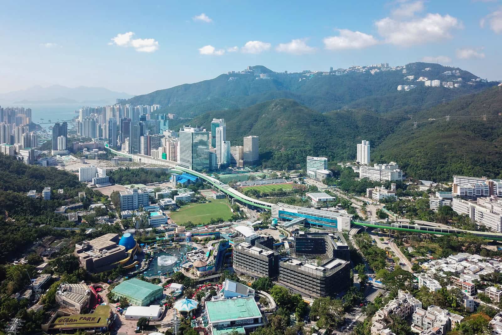 Aerial view across the dense buildings and hills of Wong Chuk Hang, Hong Kong