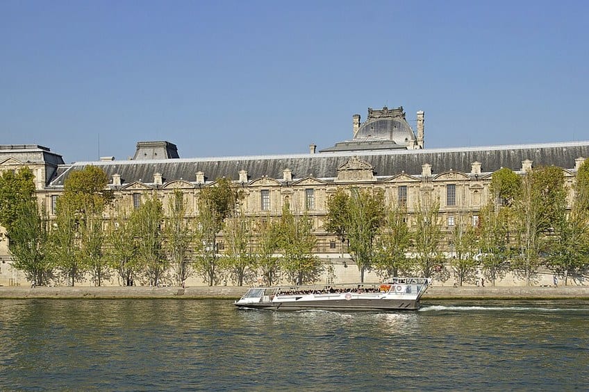 The south facade of the Louvre Palace (Grande Galerie) facing the Seine, Paris
